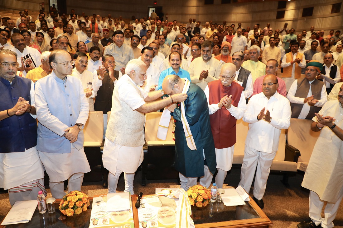 Hon'ble Prime Minister, Shri Narendra Modi felicitating BJP National president, Shri Amit Shah on his 3 successful years as BJP President and on being selected to Rajya Sabha.