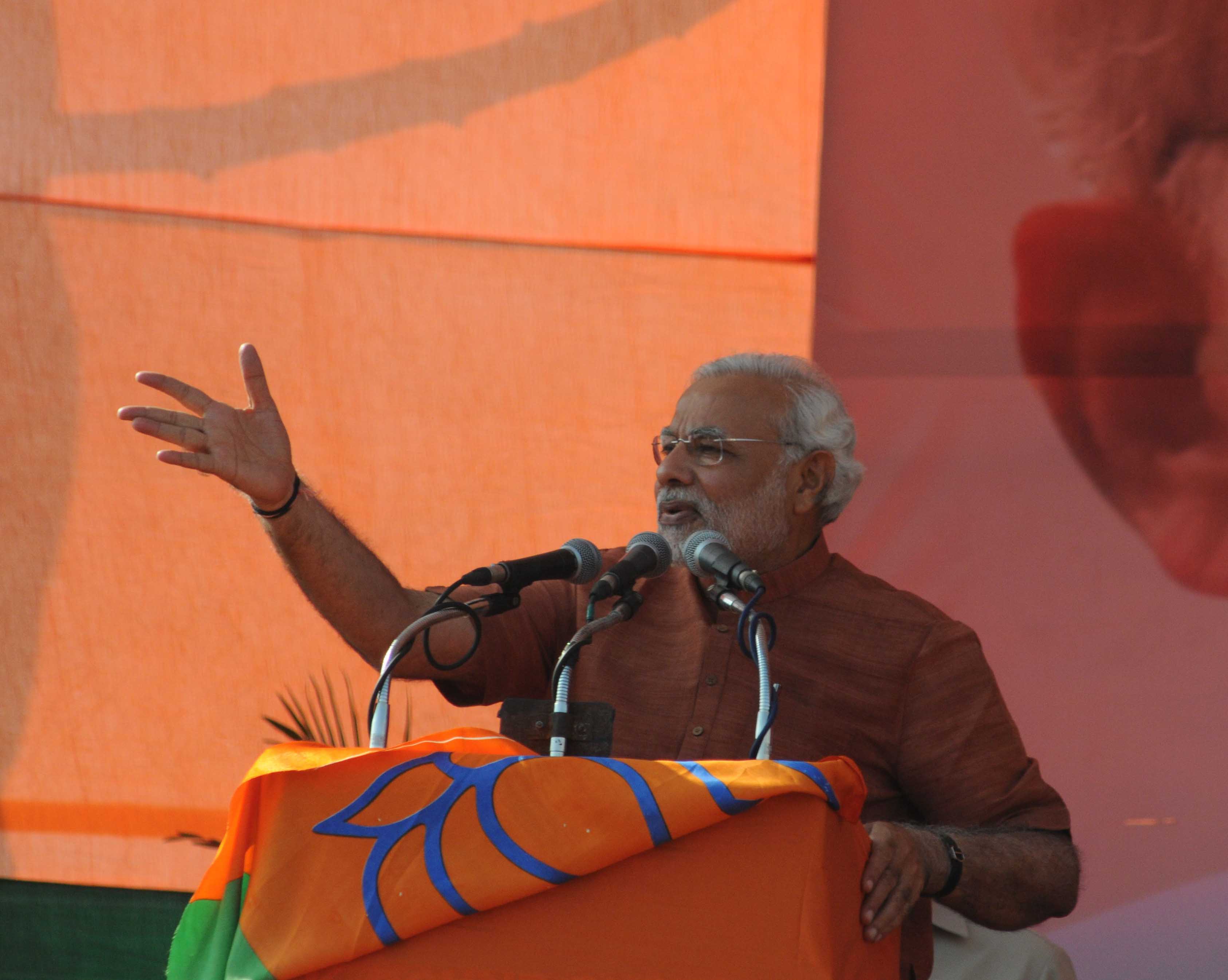 Shri Narendra Modi, Dr. Harsh Vardhan, Shri Vijay Goel and Shri Shyam Jaju during a public meeting at CBD Ground (Vishwas Nagar) Shahdara (Delhi) on November 30, 2013