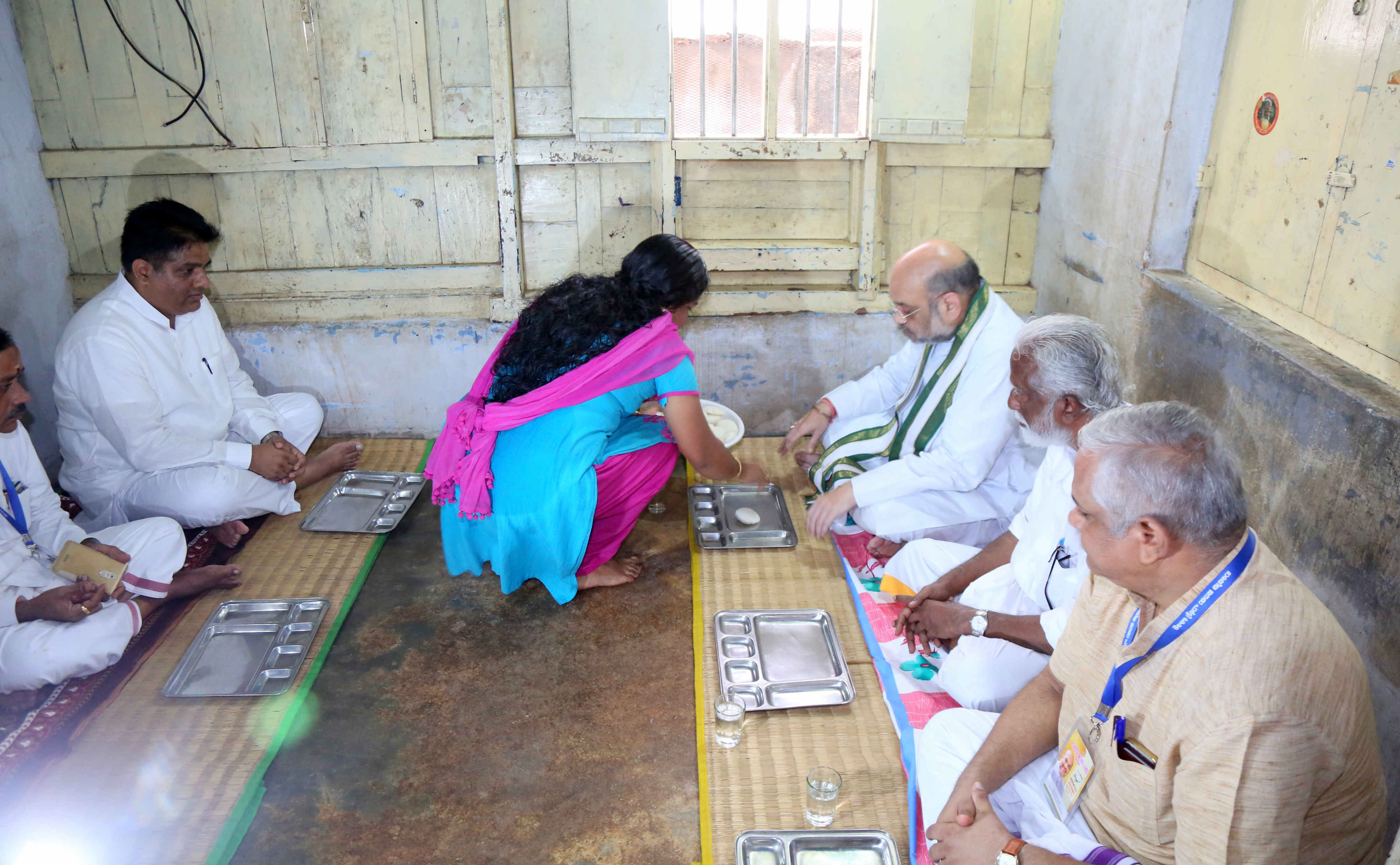 BJP National President, Shri Amit Shah having breakfast at residence of Sh Ratheesh, BJP Booth President of Booth No. 96, Chenkalchoola, Trivandrum Kerala on 4 June  2017