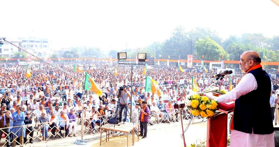 Photographs : BJP National President, Shri Amit Shah held a road show and addressing a public meeting while accompanying Gujarat State President, Shri Jitu Vaghani during his nomination filing from Bhavnagar-West Assembly