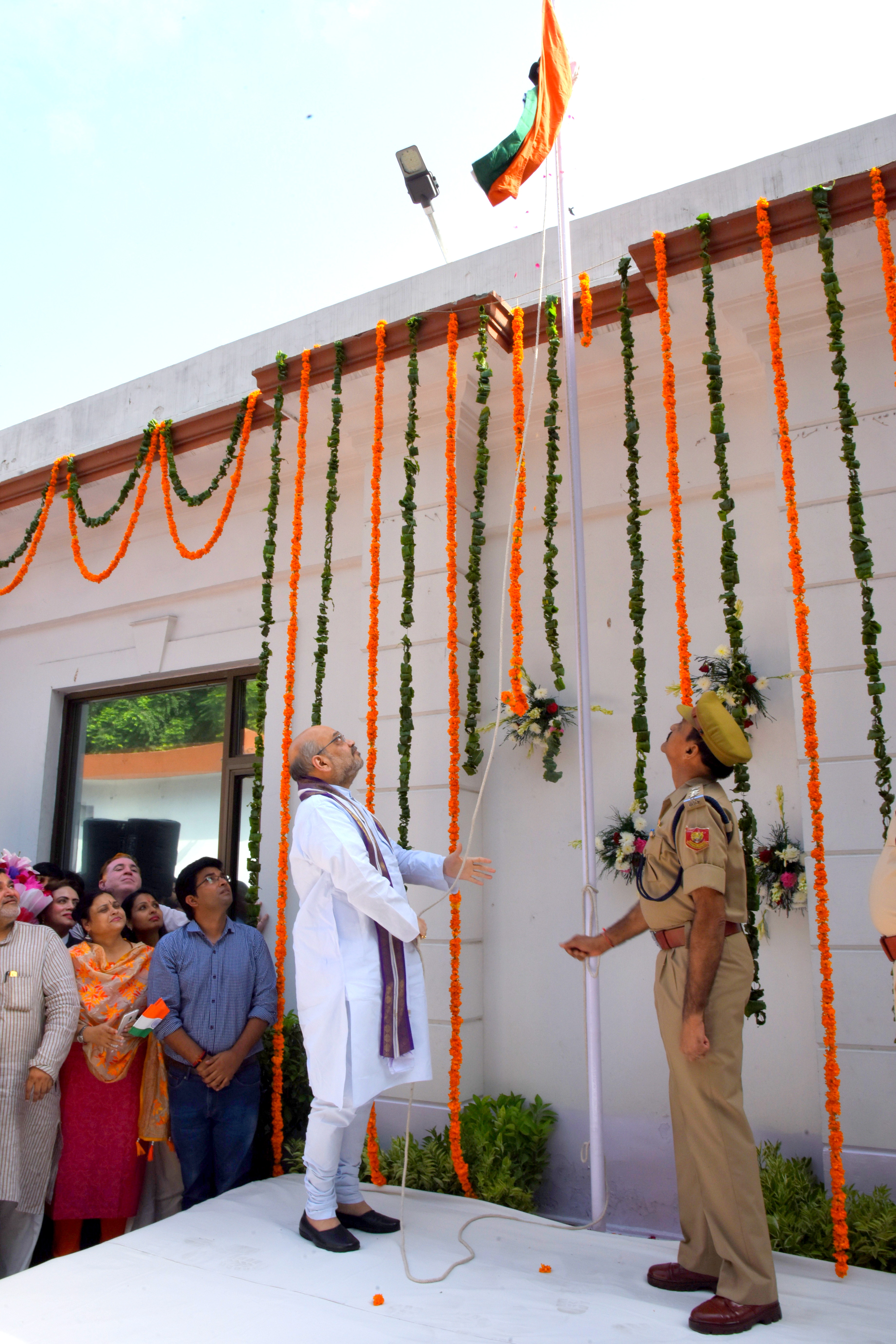  BJP National President, Shri Amit Shah hoisting national flag on Independence Day at 11, Ashok Road, New Delhi