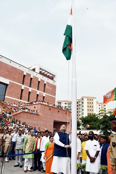 Photographs : BJP National President, Shri Amit Shah hoisting the National Flag at BJP HQ, 6A Deendayal Upadhyay Marg, New Delhi