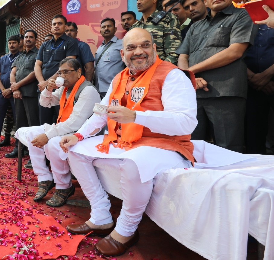 Photographs : BJP National President, Shri Amit Shah listening Hon'ble PM, Shri Narendra Modi ji's Mann Ki Baat at Booth No. 98, Dariyapur Assembly, Ahmedabad, (Gujarat)