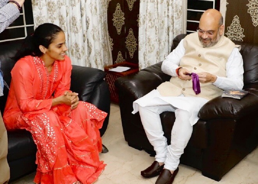 Photographs : BJP National President Shri Amit Shah met Indian Badminton player Padmbhushan Saina Nehwal" as part of Sampark for Samarthan" campaign at her residence in Hyderabad.