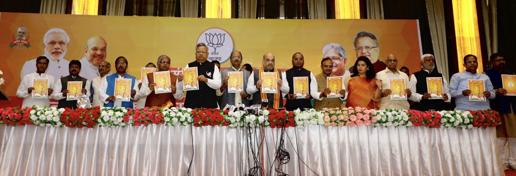 Photographs : BJP National President, Shri Amit Shah releasing Chhattisgarh BJP's Sankalp Patra – 2018 for state assembly elections in Raipur