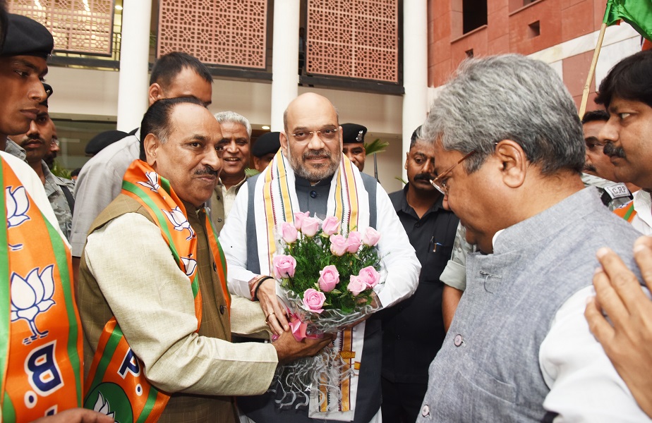 Photographs : BJP National President, Shri Amit Shah welcomed by SC Morcha at BJP Headquarter on approving SC/ST prevention of atrocities amendment Act by Cabinet.