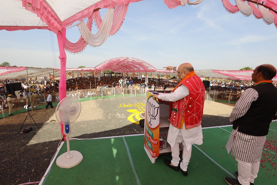 Photographs of BJP National President, Shri Amit Shah addressing a public meeting in Kukshi (Madhya Pradesh)