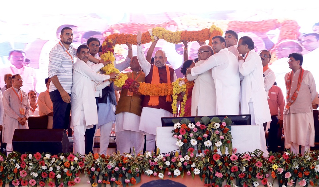 Photographs of BJP National President, Shri Amit Shah addressing Booth Karyakarta Sammelan in Dhankya, Jaipur (Rajasthan)