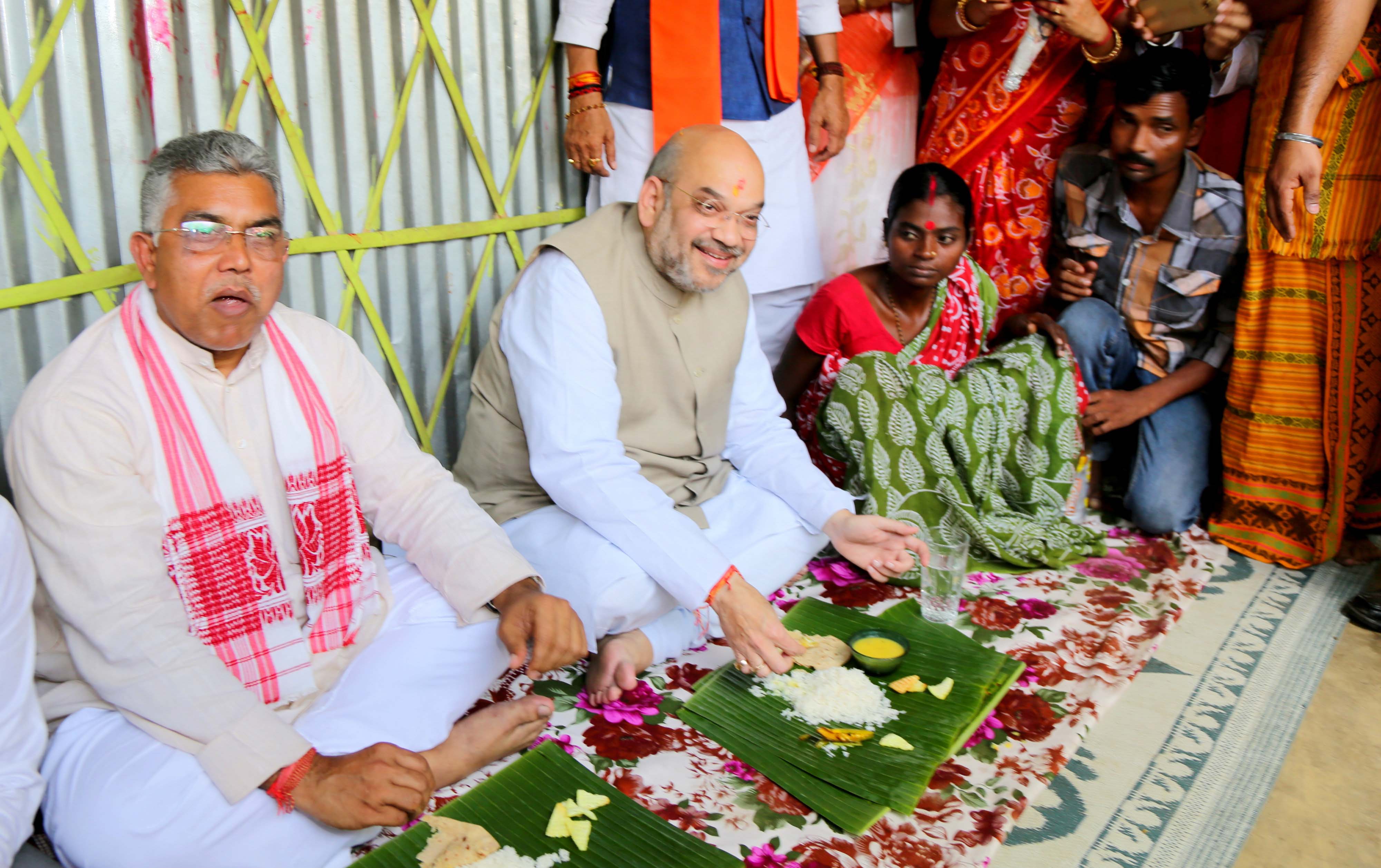 BJP National President Shri Amit Shah doing Booth Sampark at Booth No. 93, Naxalbari and had lunch at Raju Mahali's house at Dakkhin Katiajote village in Naxalbari,West Bengal on April 22, 2017.