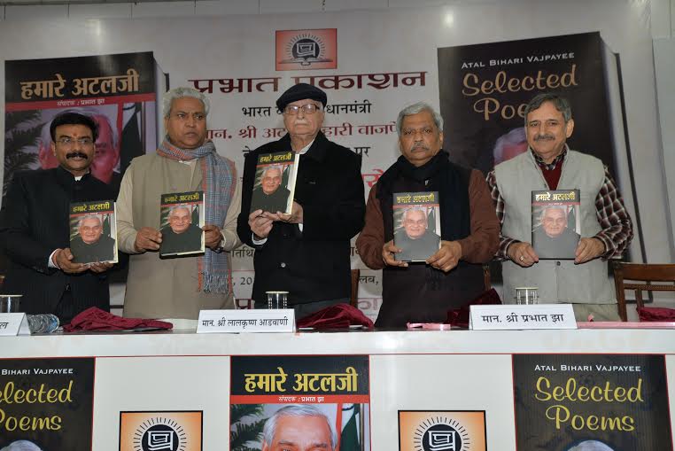 Shri L.K. Advaniji, Shri Ramlalji, Shri Prabhat Jha releasing "HAMARE ATALJI" at Speaker Hall, Constitution Club, Rafi Marg on December 25, 2014