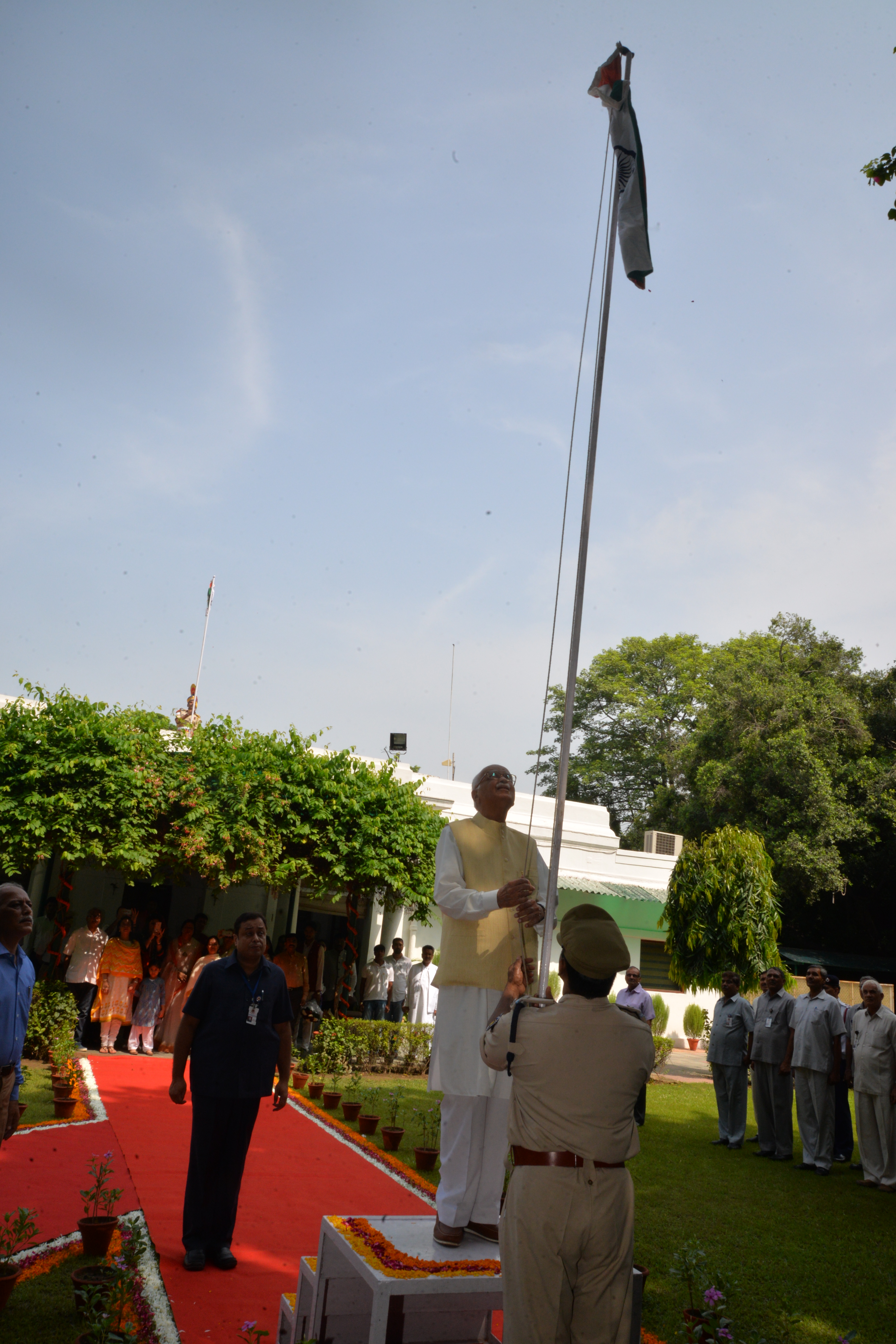 Shri L.K. Advaniji unfurling the National Flag on the occasion of Independence Day at his residence 30, Prithviraj Road on August 15, 2016