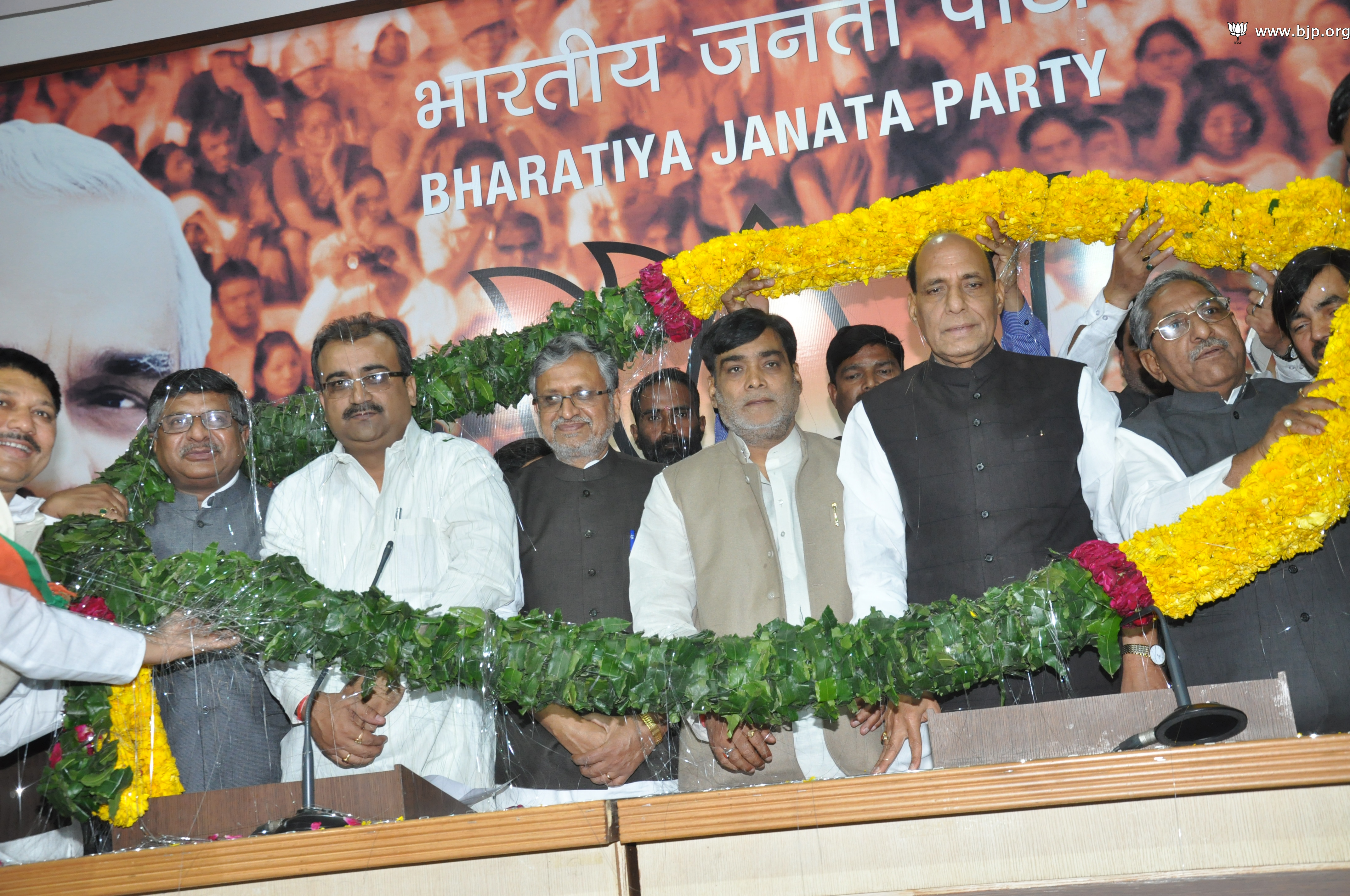 Shri Ramkripal Yadav (MP, Rajya Sabha), Shri Hemlal Murmur, Ex-MP & MLA & Shri Bimal Kumar(IAS) joining BJP in the presence of BJP President, Shri Rajnath Singh at 11, Ashoka Road on March 12, 2014 