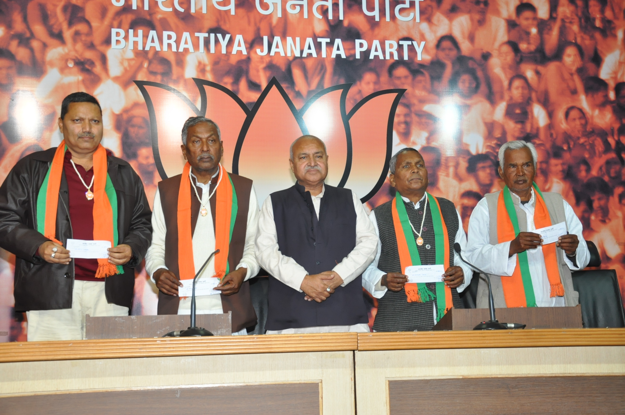 Shri Ramrati Bind, Shri Dhirendra Pratap Singh, Shri Balkrishanan Chouhan, Shri Fagu Chouhan joining BJP on January 28, 2014