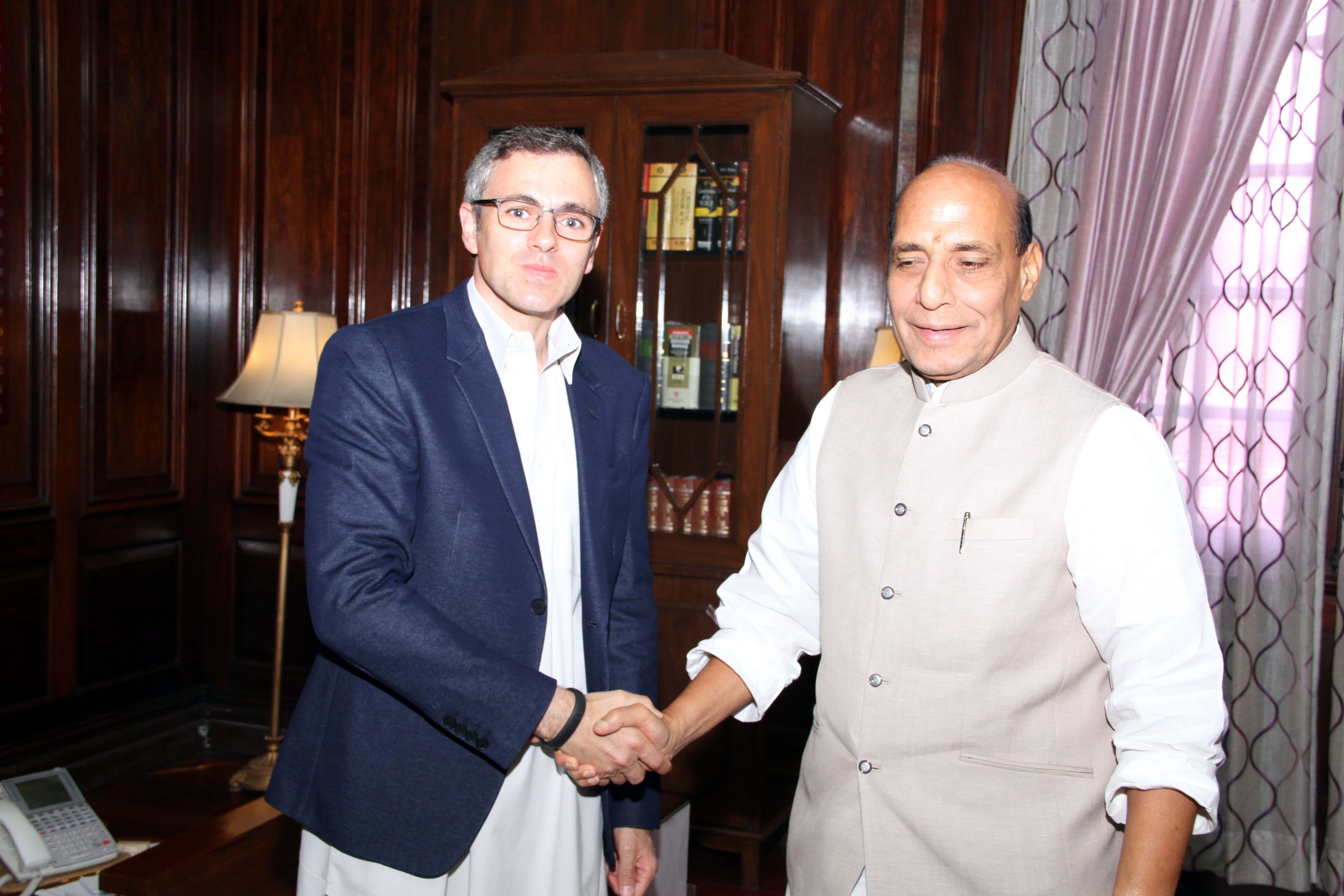 The Union Home Minister Shri Rajnath Singh meeting with the Chief Minister of Jammu & Kashmir Shri Omar Abdullah at North Block (New Delhi) on 20 June 2014