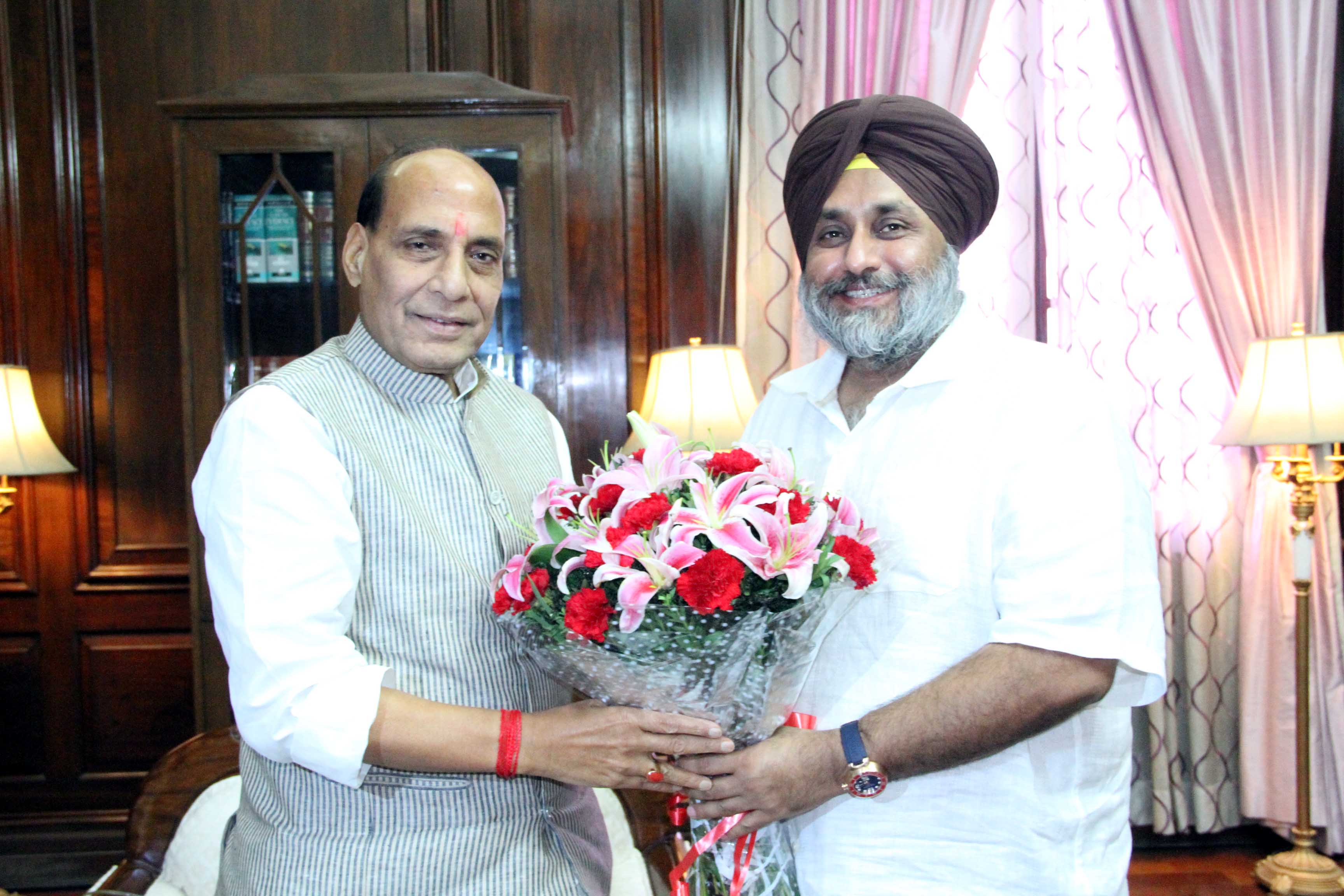 The Union Home Minister Shri Rajnath Singh Meeting with the Deputy Chief Minister of Punjab Shri Sukhbir Singh Badal at North Block (New Delhi) on 04 July 2014