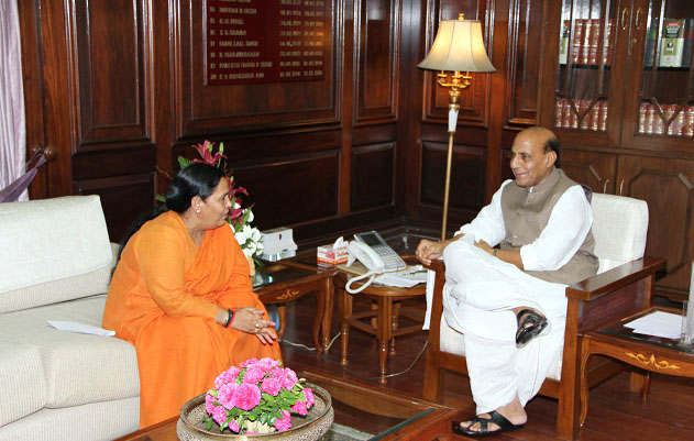 The Union Home Minister Shri Rajnath Singh meeting the Union Water Resources Minister Sushri Uma Bharati at North Block (New Delhi) on 17 June 2014